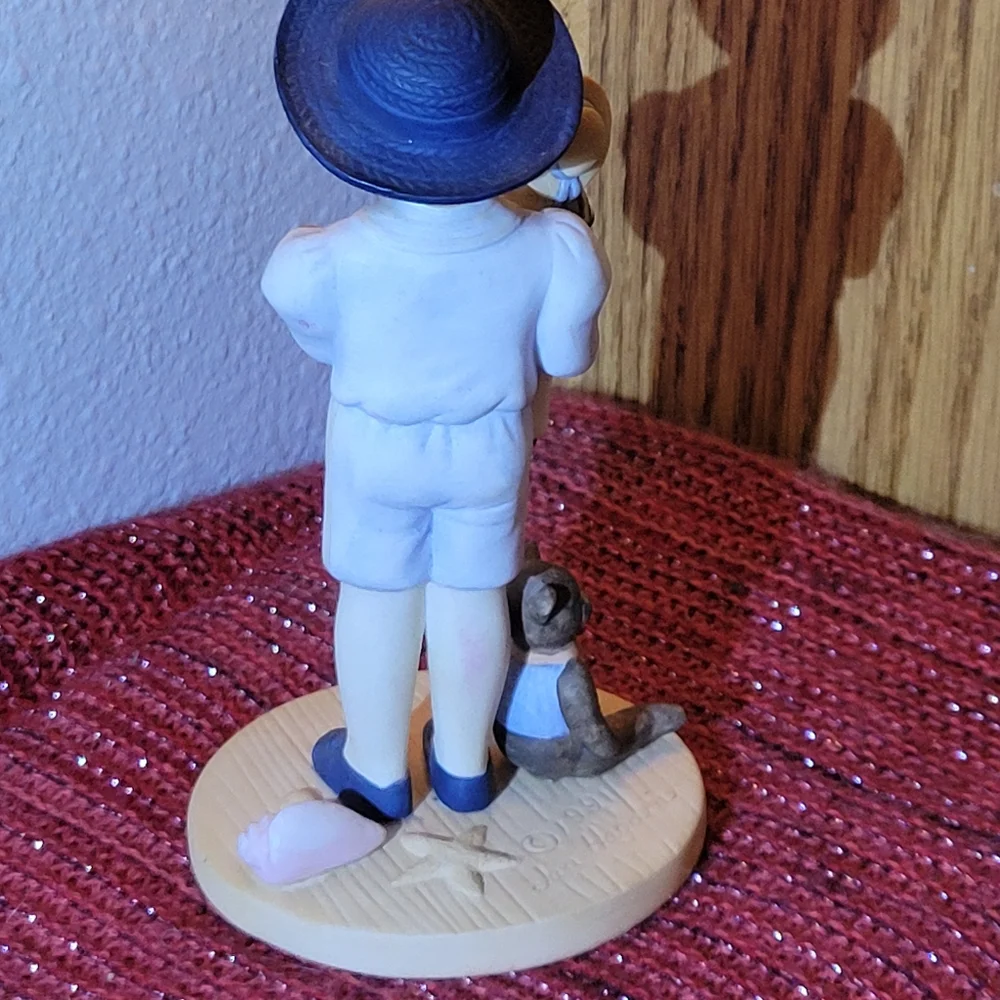 VINTAGE PORCELAIN BOY WITH DOLL FIGURINE 